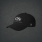 Side view of black dad hat with "Rise from the ashes" embroidered on the front and a Phoenix Redline label on the side.